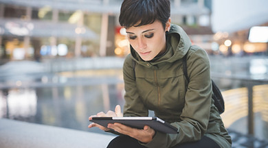 Young Woman Reading Tablet
